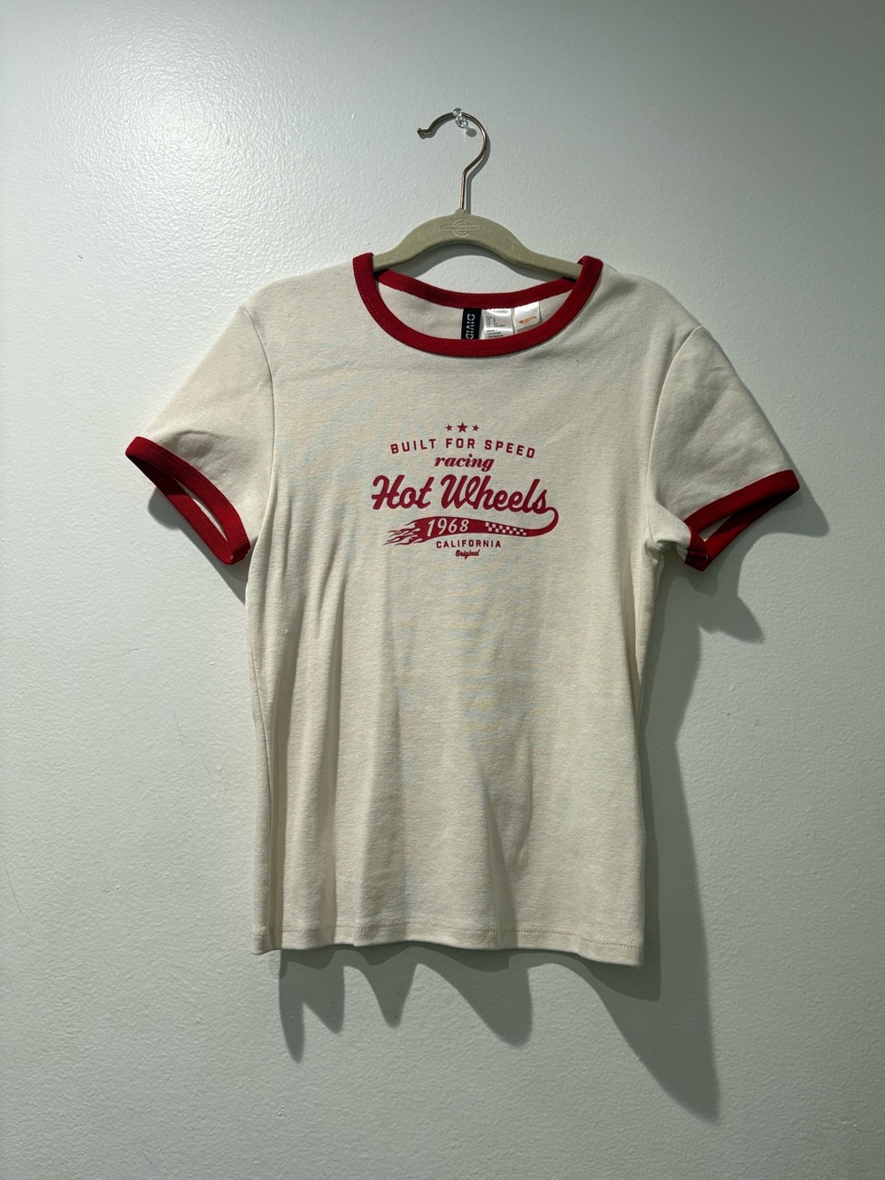 Divided Cream Ringer Tee with Red Trim and Racing Graphic
